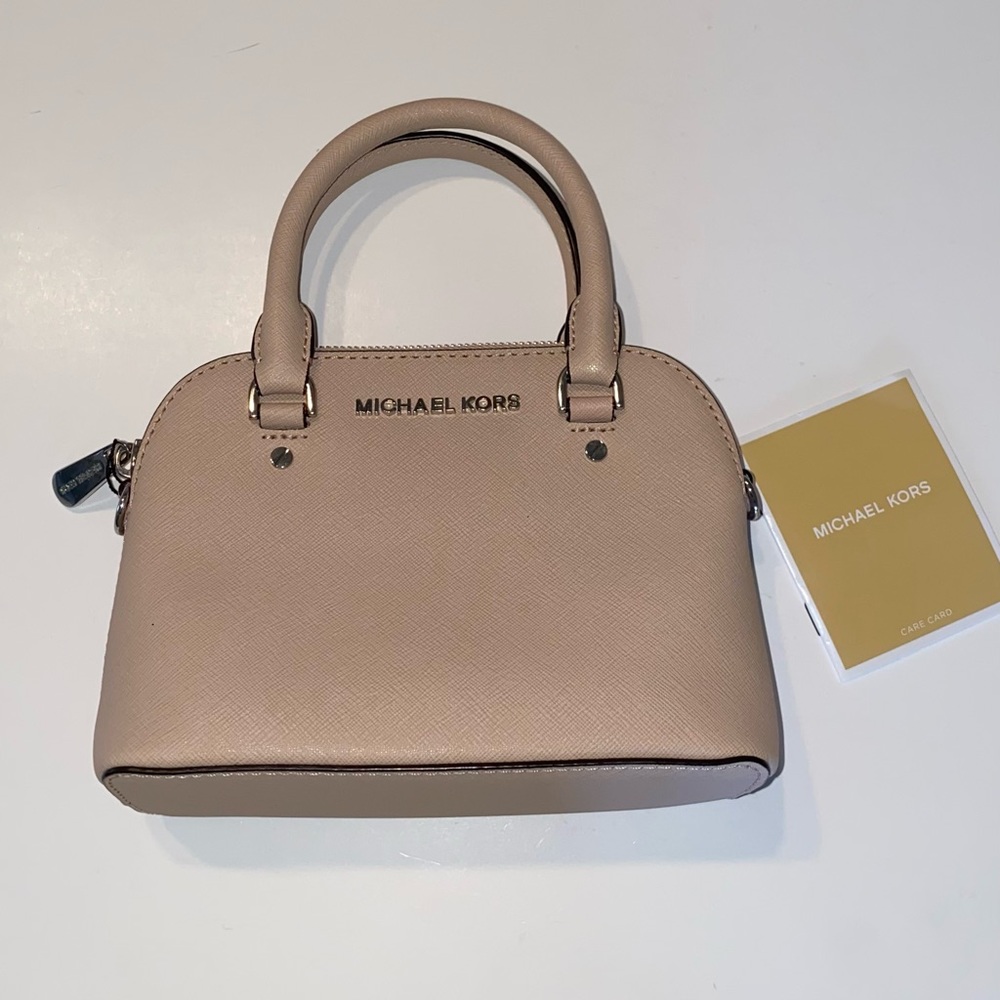 Michael Kors mini pink bag